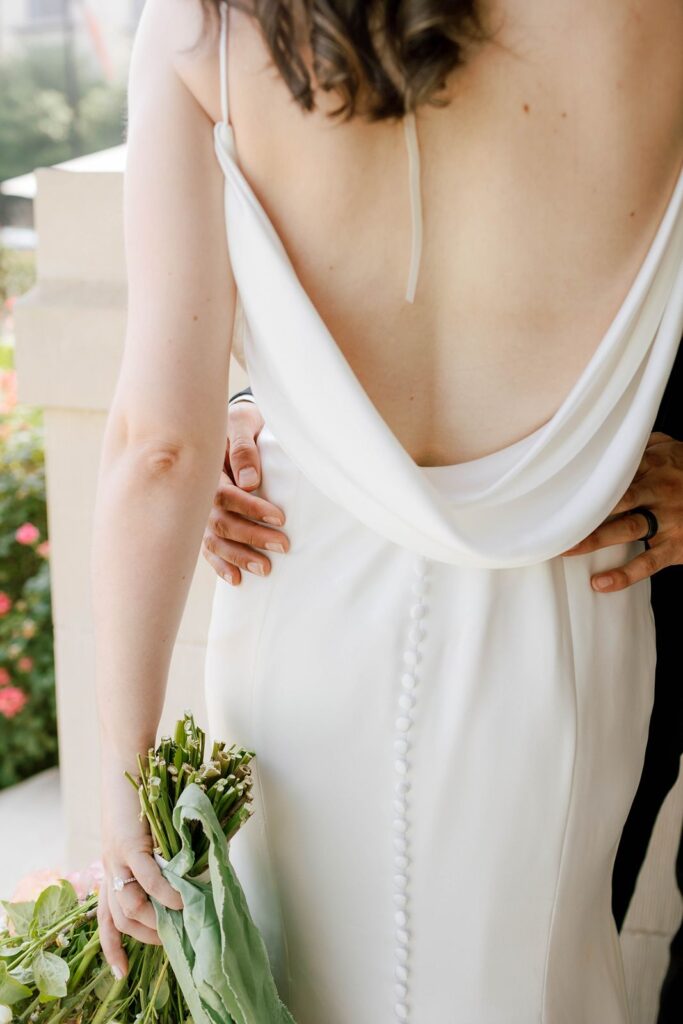 up close photo of wedding dress at Hotel Ella